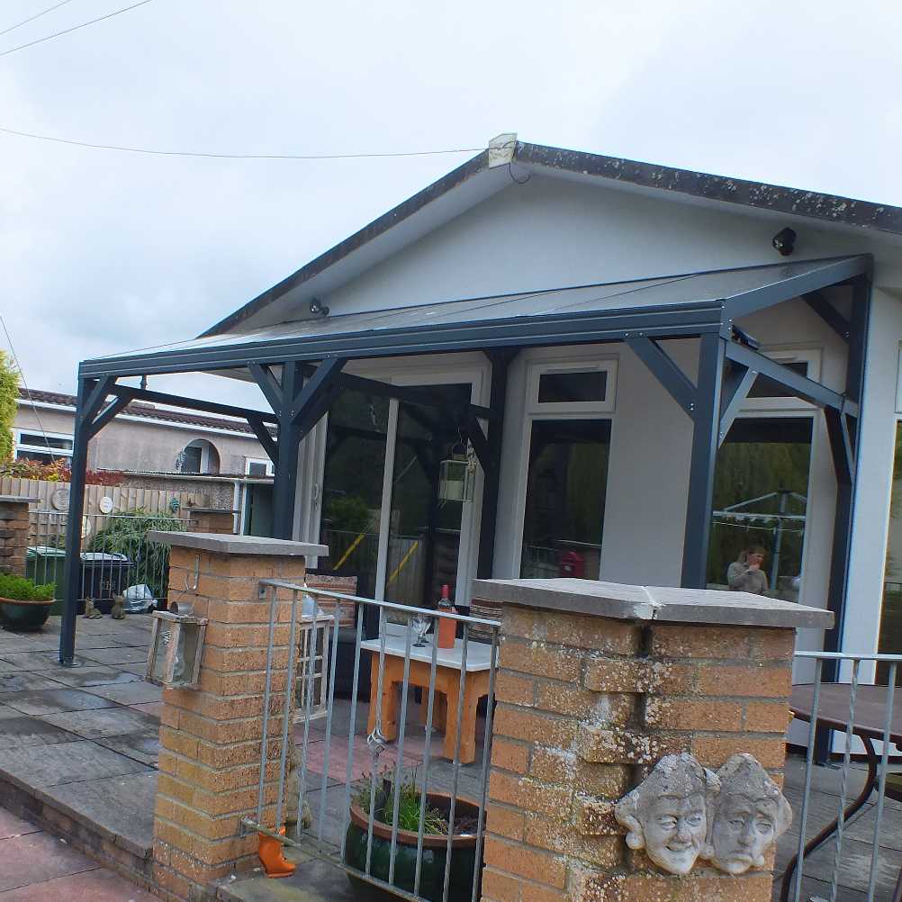 Great selection of Omega Smart Free-Standing, Anthracite Grey MonoPitch Roof Canopy with 16mm Polycarbonate Glazing - 3.1m (W) x 2.0m (P), (4) Supporting Posts