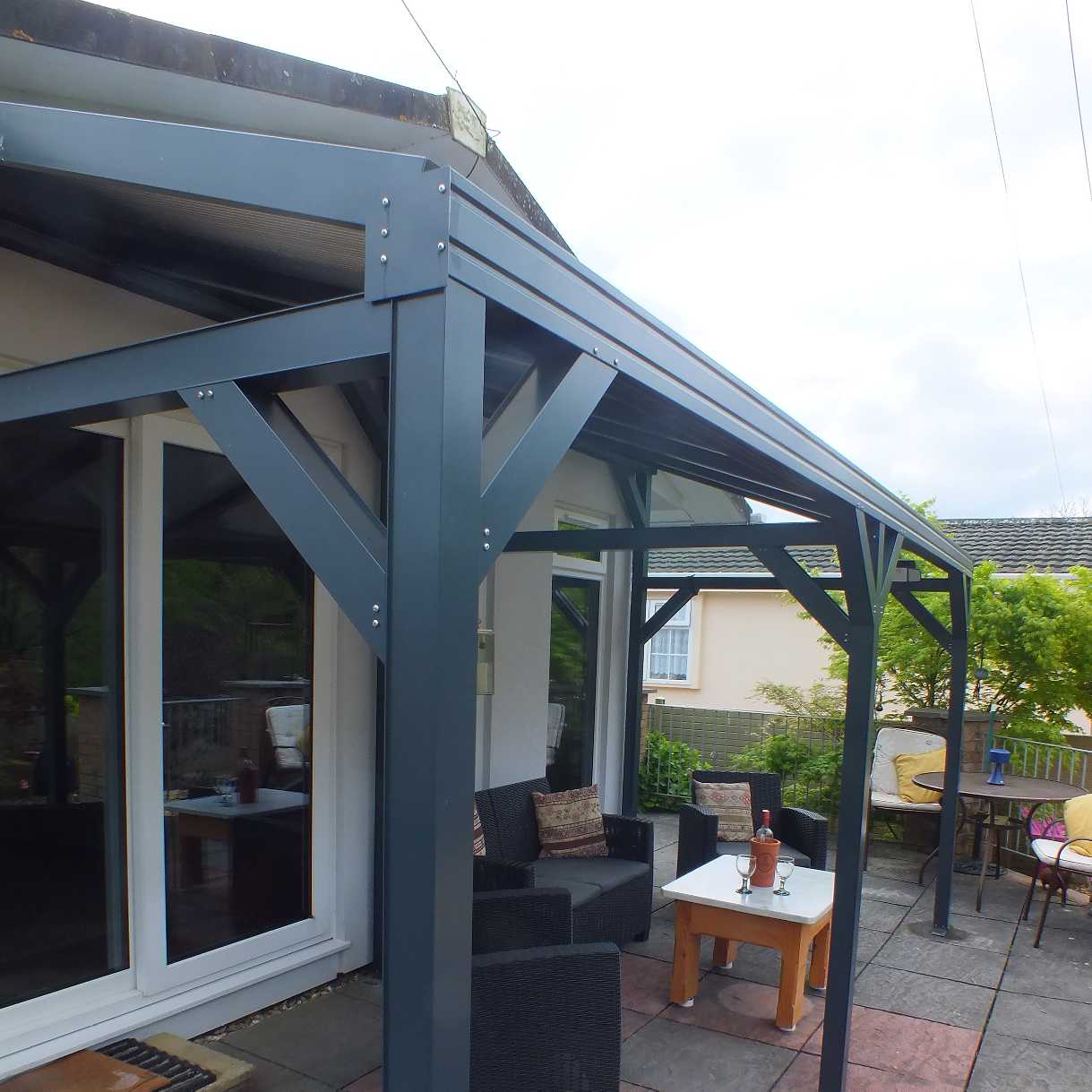 Affordable Omega Smart Free-Standing, Anthracite Grey MonoPitch Roof Canopy with 16mm Polycarbonate Glazing - 7.8m (W) x 3.5m (P), (8) Supporting Posts