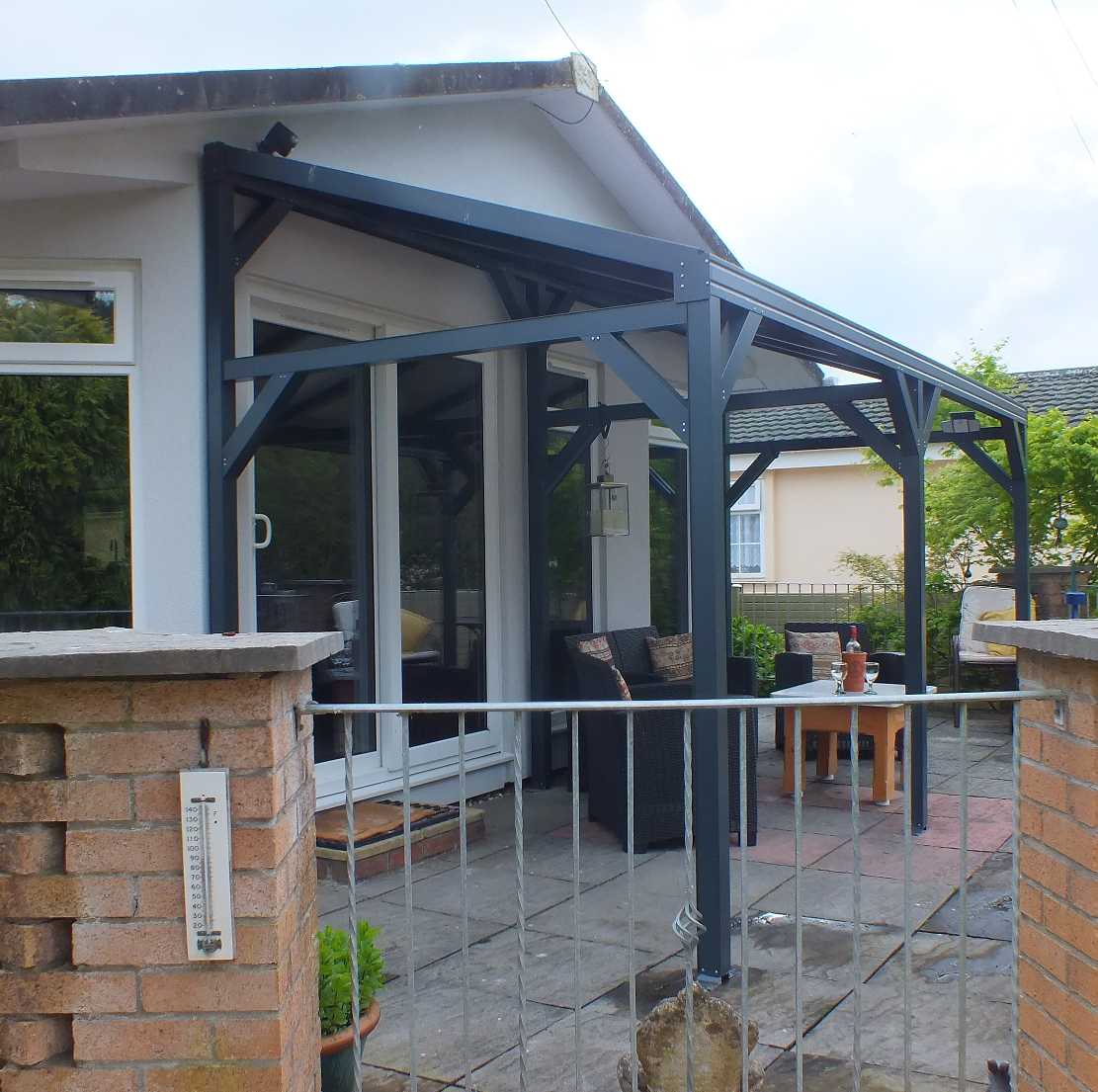 Great deals on Omega Smart Free-Standing, Anthracite Grey MonoPitch Roof Canopy with 6mm Glass Clear Plate Polycarbonate Glazing - 4.9m (W) x 2.5m (P), (6) Supporting Posts