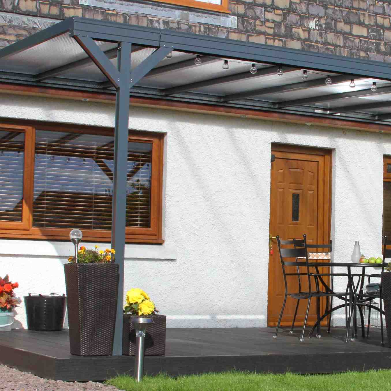 Omega Verandah, Anthracite Grey, 16mm Polycarbonate Glazing - 8.4m (W) x 1.5m (P), (4) Supporting Posts